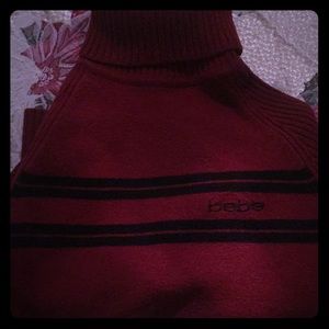 Small Bebe red turtle neck sweater